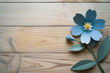 Obraz premium Flower with leaf paper cutout design in wood background with copy space. Spring season minimalist backdrop. Seasonal