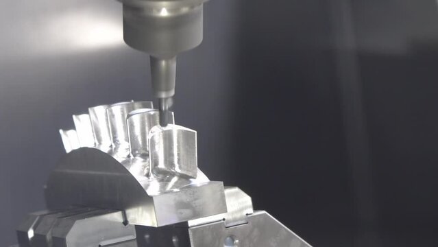 The 5-axis CNC milling machine  cutting the water turbine part with solid ball end mill tool.