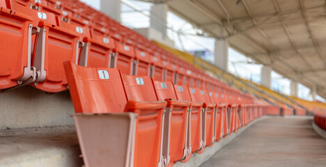 Empty arena seats with numbers in a stadium on sport game festival