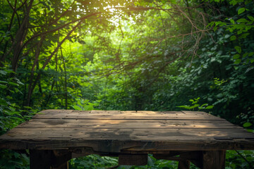 A wooden table in a forest with a view of the trees