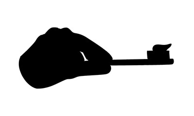 silhouette of hand holding toothbrush