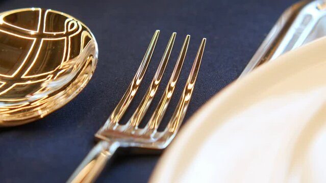 Shiny Silver Spoons on a Wooden Surface with Beautiful Reflections and Elegant Shine