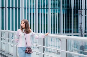 Portrait young beautiful asian woman with happy smile around outdoor urban city.