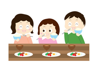 ご飯を食べる家族