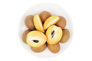 delicious sapodilla fruit in white serving plate isolated transparent