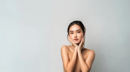 Obraz premium Beautiful young asian woman with clean fresh skin on white background, Face care, Facial treatment, Cosmetology, beauty and spa, Asian women portrait.
