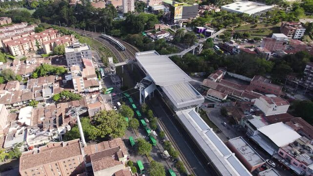 Aerial view of Medellin's Comuna 13 with Metrocable station and urban landscape, Colombia
