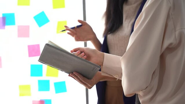 Successful business concept, Businesswoman holds and point financial document to analyzing dat