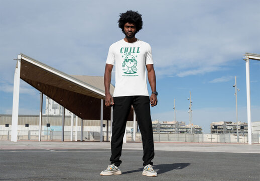 Mockup of man wearing customized t-shirt in parking lot
