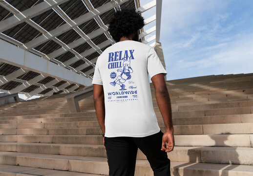Mockup of man wearing customized t-shirt on steps