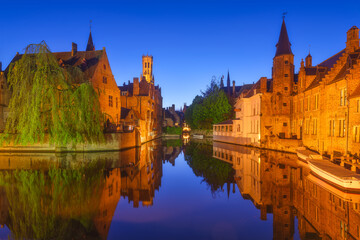 Obraz premium Bruges, Belgium. Historic part of the city. Architectural landscape during the blue hour. Old famous buildings. Picture for wallpaper, postcards, background, design.