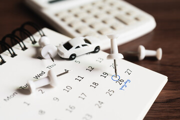 For payment plan, schedule, buy or sell property planning concept. Close up of embroidered white...