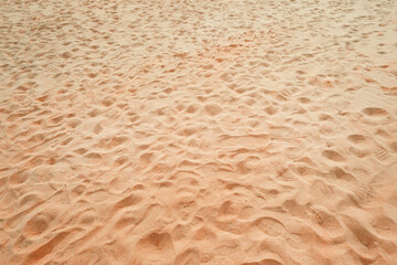 Shoeprints on tropical beach sand