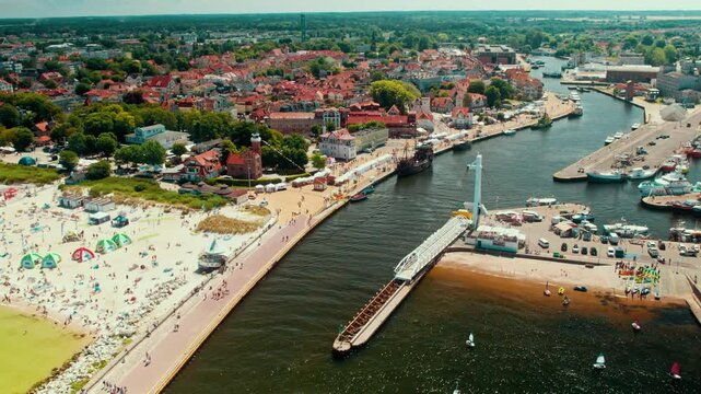 Port in a small twon by the sea with a foot bridge