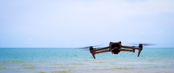 Fototapeta premium drone flying in the wind with sea background