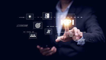 Key Performance Indicator Planning KPI, Company Management Business Internet Technology Concept, Businessman using a laptop with document management, enterprise resource management software system