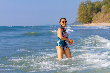 Woman body big with swimsuit relax at beach