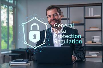 Smiling businessman in formal wear working on laptop at office workplace with smartphone and notebooks. Concept of successful business deal, agreement. datum security icons.