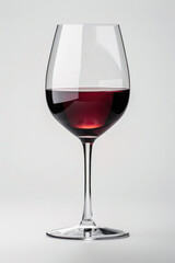 A glass of red wine on a white background, showcasing its rich color and clarity