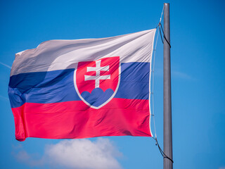 The flag of the Slovak Republic consists of three stripes (white-blue-red tricolor), of the same length placed below each other, and the Slovak coat of arms.