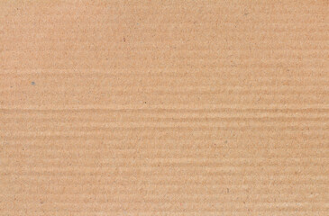 Cardboard sheet texture background, detail of recycle brown paper box pattern.