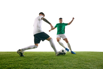 Two soccer players locked in struggle for ball on green lash playground against white background, show skills and determination. Concept of professional sport, championship, final match, movement. Ad