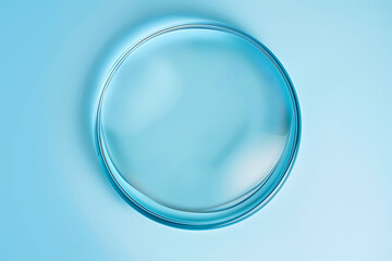 Circle shape in glass effect on blue color background for product presentation.