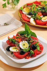 Anchovies and tomatoes salad.