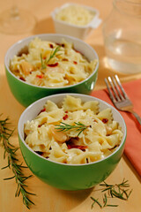 Farfalle with almonds and ham.