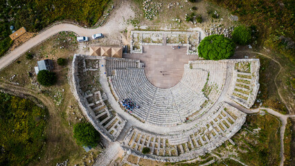 Aerial view of Archaeological Park of Segesta ruins in Sicily , temple and theatre top down 