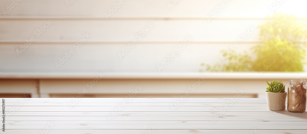 Poster A white wooden table sits empty against a blurred interior background providing a clean and versatile copy space image with a white color tone