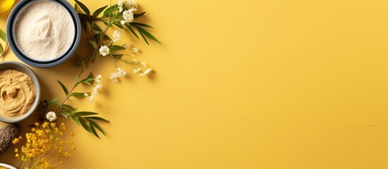 Naklejka na ściany i meble A top down view of a yellow deck adorned with a set of homemade cosmetics ingredients including cosmetic clay The image captures the essence of spa treatments and an aroma themed atmosphere Perfect a