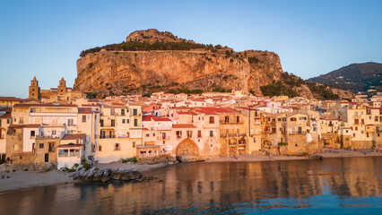 Obraz premium old windmill in trapani salt pond sicily italy 