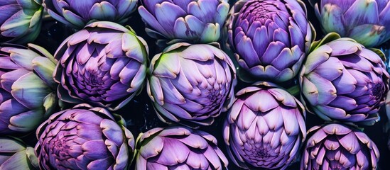 Fototapeta premium Outdoor Italian food market selling fresh Italian artichokes perfect for adding to your dishes Copy space image to showcase their vibrant colors