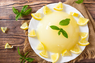 Traditional Sicilian Lemon Pudding with Lemon juice, corn starch and sugar, on wooden background....