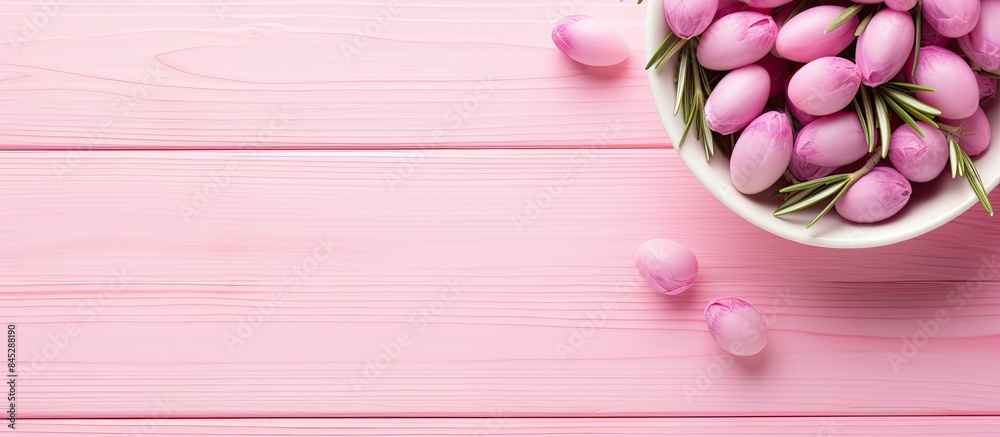 Aufkleber a pink olives and fresh rosemary arrangement in a small bowl is presented on a light wooden backgrou