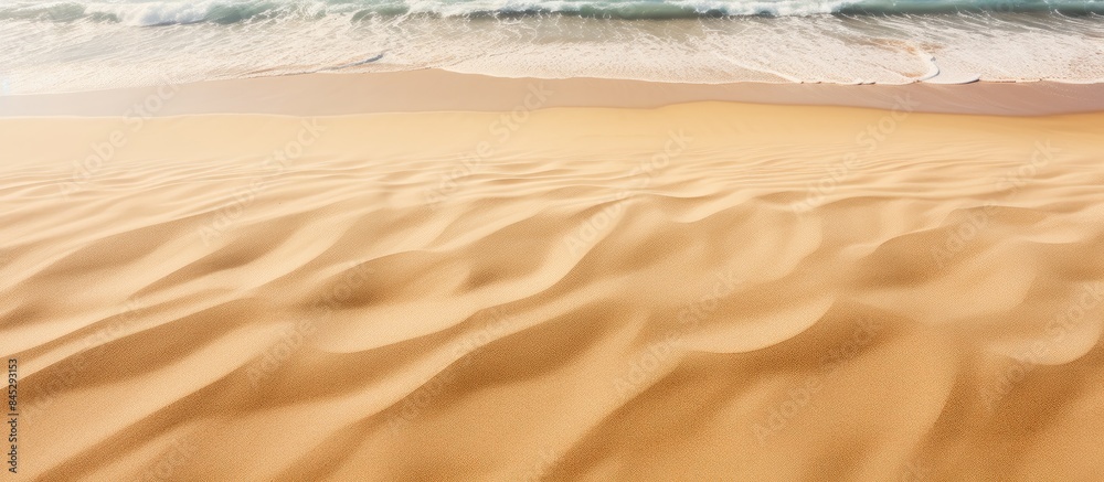 Aufkleber sea sand with a textured surface marked by bird tracks creates a natural background the waves of san