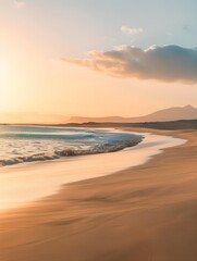 Fototapeta premium Bask in the warm glow of sunset at Morro Jable, Fuerteventura, where golden sands meet tranquil Atlantic waters