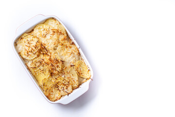 Potato gratin baked with cream and cheese isolated on white background. Top view. Copy space