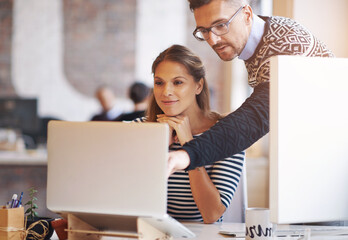 Business, manager and business people on laptop for help, feedback and training intern in office....