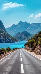 Empty highway between mountain peaks, sea coast on one side of the road, blue water, clear sunny day, incredible nature, bright saturated colors