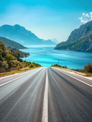 Empty highway between mountain peaks, sea coast on one side of the road, blue water, clear sunny day, incredible nature, bright saturated colors