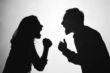 Silhouettes of a arguing couple