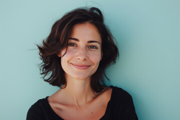 Fototapeta premium A close up portrait of a woman with a subtle smile