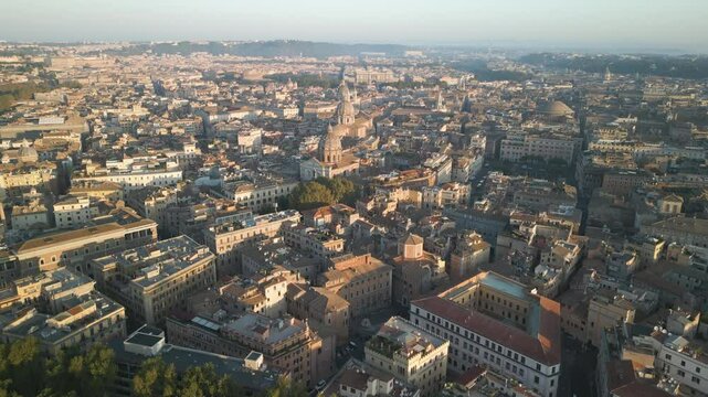 Panoramic aerial dolly establishes cathedral basilica domes of the Orange Garden Italy