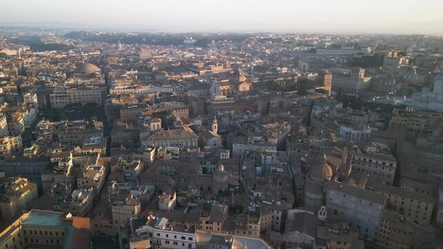 Panoramic aerial overview of sunset light across historic homes of the Orange Garden Italy