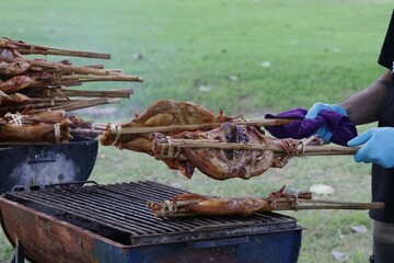 Grilled chicken on a charcoal grill