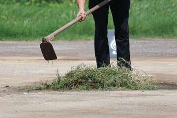 person with shovel