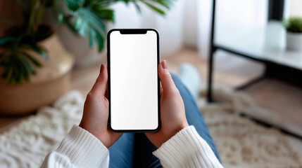 Mockup woman's hand holding using smart phone with white blank screen POV, mobile app design and advertising, online marketing