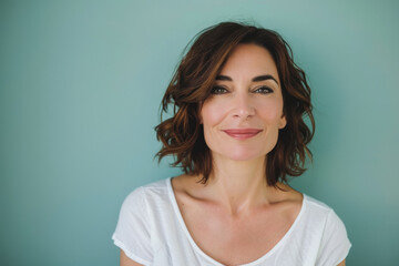 Fototapeta premium A close up portrait of a woman with a subtle smile